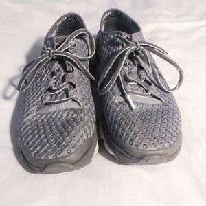 Under Armour athletic shoes.